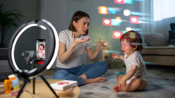 When motherhood becomes a battleground: is the influencer who proudly broadcasts every tantrum, meltdown, and private moment of her toddler to millions a brave truth-teller about the chaos of parenting or a ruthless exploiter turning her child into unpaid content, and at what point does “sharing” cross the line into digital child labor, stolen privacy, and a permanent online record that kid never asked for?